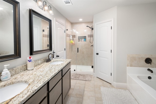 bathroom with vanity, tile patterned floors, and independent shower and bath