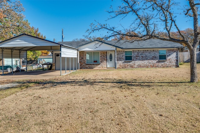 view of front of property with a carport and a front yard