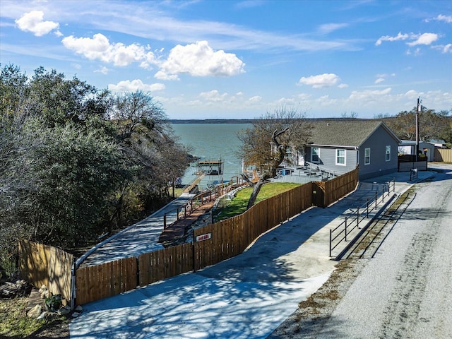 exterior space with a water view