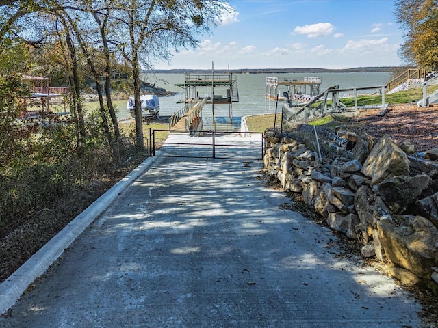 exterior space with a water view