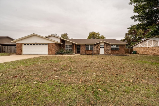 ranch-style house with a garage and a front yard