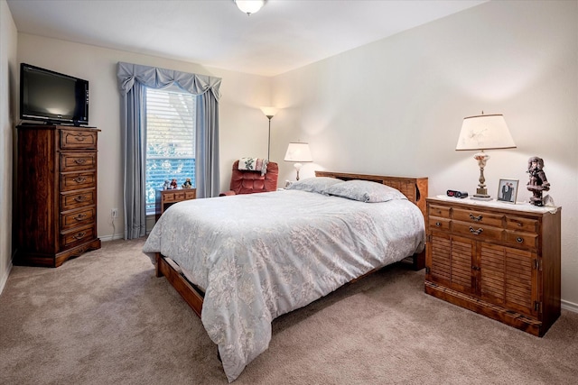 bedroom with light carpet