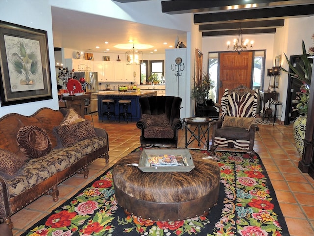 living room featuring beam ceiling, light tile patterned floors, and a notable chandelier