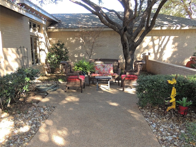 view of yard with an outdoor living space and a patio