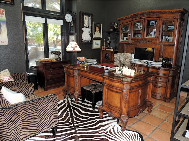 home office featuring light tile patterned floors