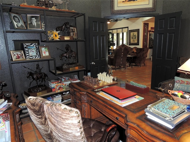 home office with tile patterned floors