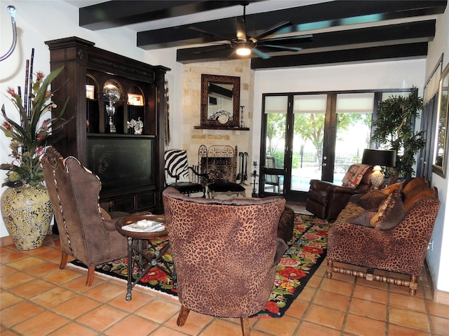 tiled living room featuring ceiling fan, a large fireplace, beam ceiling, and french doors