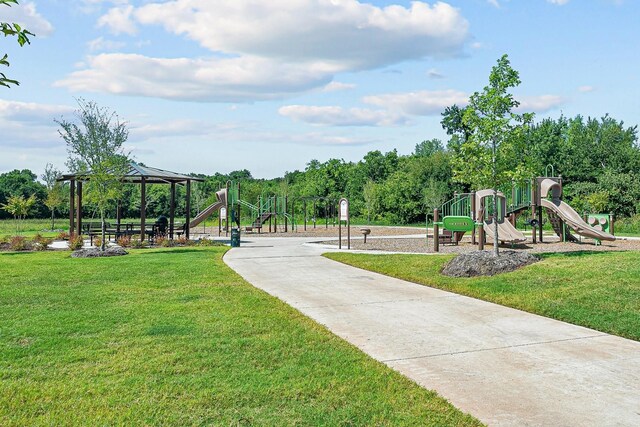 view of play area featuring a gazebo and a lawn