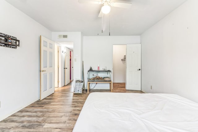 bedroom featuring ceiling fan and light hardwood / wood-style flooring