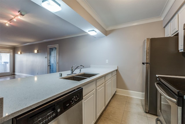 kitchen featuring appliances with stainless steel finishes, crown molding, sink, light tile patterned floors, and white cabinets