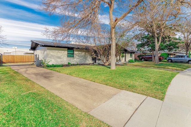 single story home with a front yard and central air condition unit