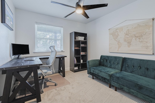 office area with light carpet and ceiling fan