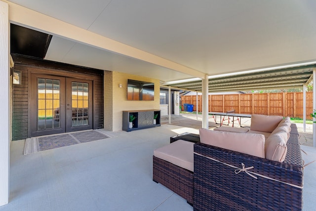 view of patio featuring outdoor lounge area and french doors