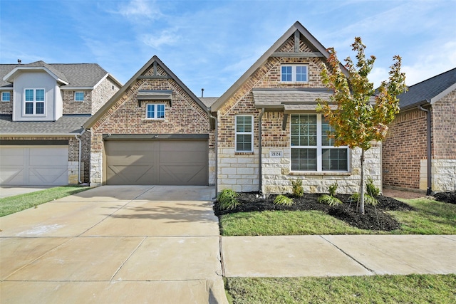 view of front of home with a garage