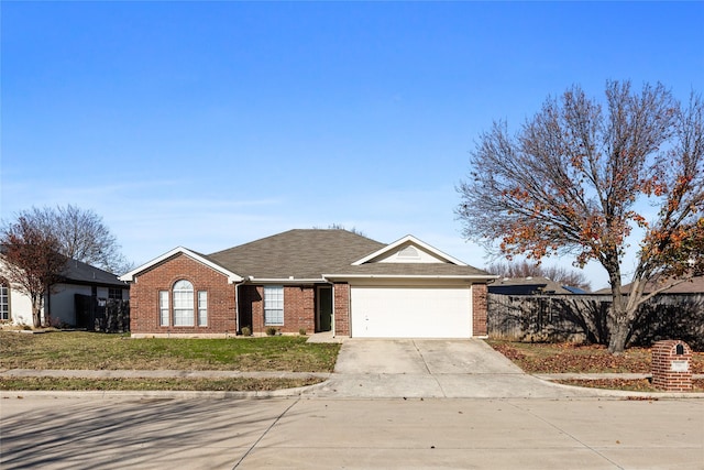 single story home with a garage and a front yard