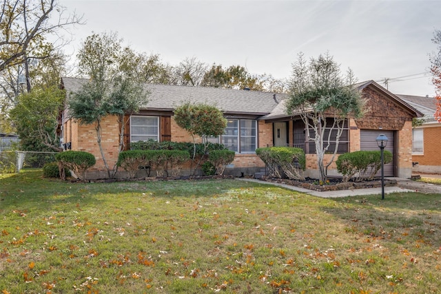 ranch-style home featuring a front yard