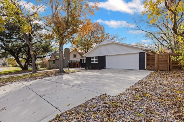 ranch-style home with a garage