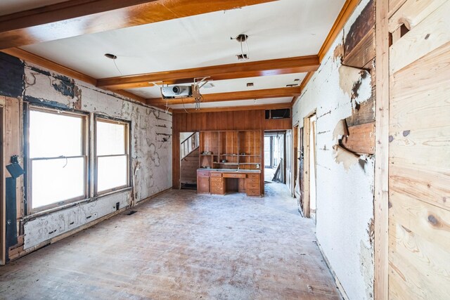 interior space with beamed ceiling