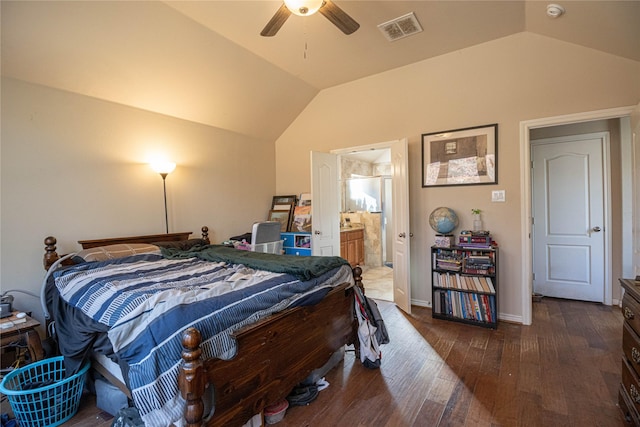 bedroom with vaulted ceiling, ensuite bathroom, ceiling fan, and dark hardwood / wood-style floors