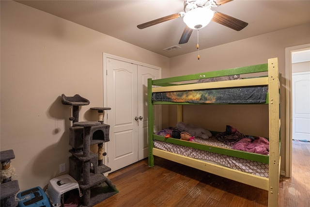 bedroom featuring hardwood / wood-style flooring and ceiling fan