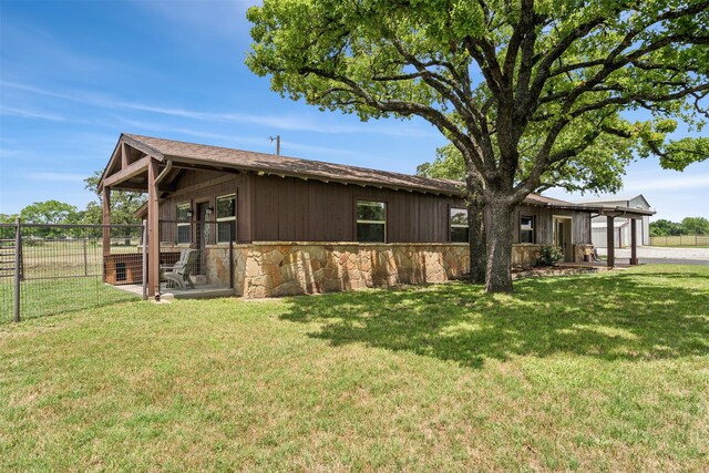 exterior space featuring a front lawn