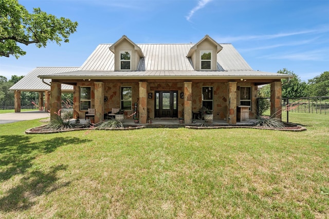 view of front of property featuring a porch and a front lawn