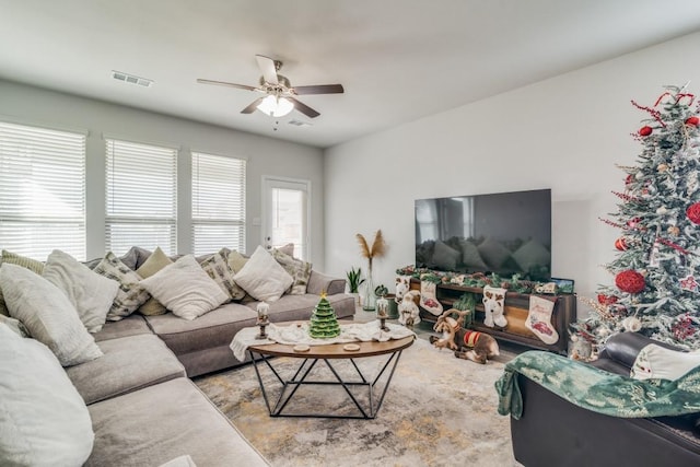 living room featuring ceiling fan