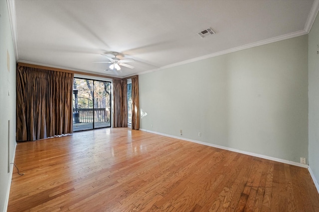 spare room featuring ceiling fan, crown molding, and light hardwood / wood-style flooring