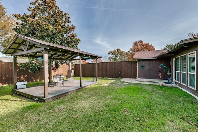 view of yard with a deck