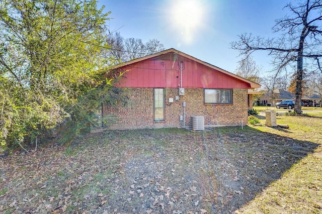 view of side of property featuring cooling unit