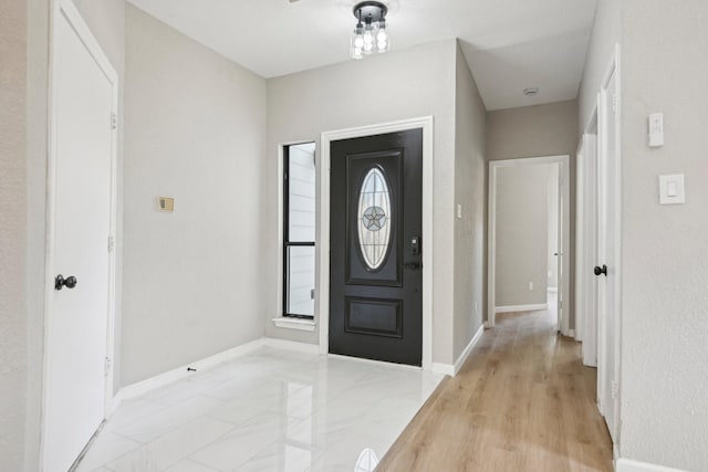 entrance foyer with light hardwood / wood-style floors