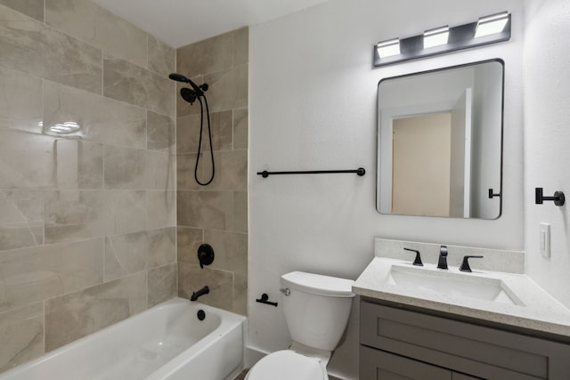 full bath featuring tub / shower combination, vanity, and toilet