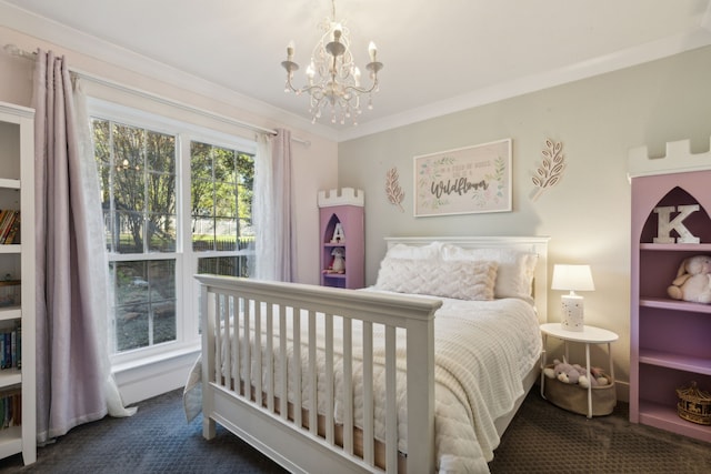 bedroom with dark colored carpet, an inviting chandelier, and ornamental molding