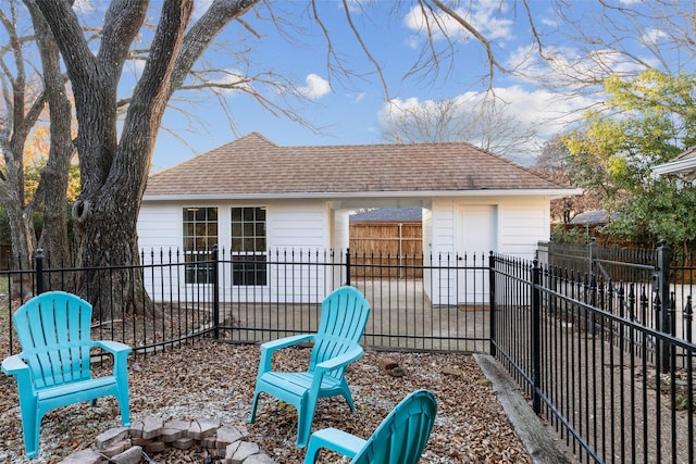 view of patio with a fire pit