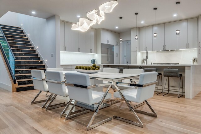 dining room featuring light hardwood / wood-style flooring