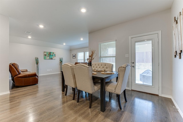 dining area featuring wood-type flooring