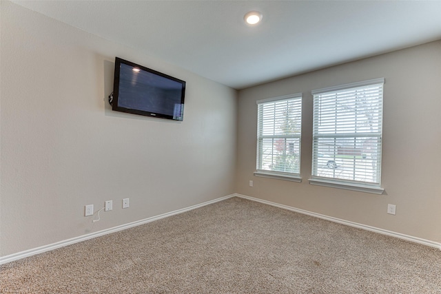 view of carpeted spare room