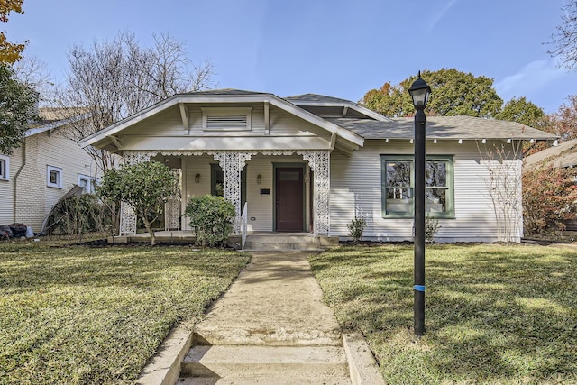 bungalow with a front yard