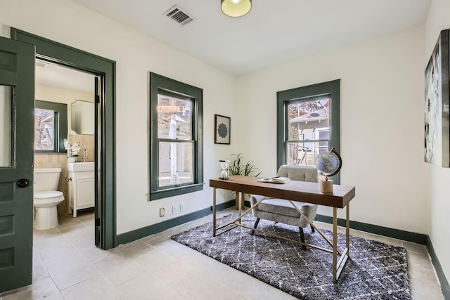 office space featuring light tile patterned flooring