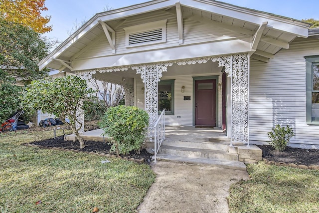 doorway to property featuring a porch