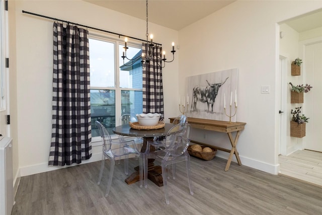 dining space featuring hardwood / wood-style flooring