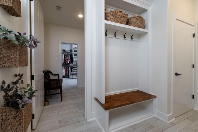 mudroom with light wood-type flooring