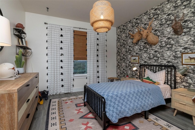 bedroom featuring wood-type flooring