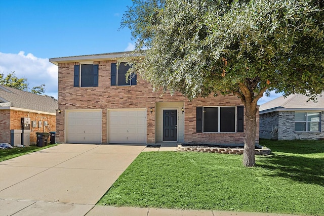 view of front of property featuring a garage and a front yard