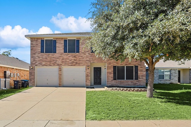 view of front of home with a garage and a front yard