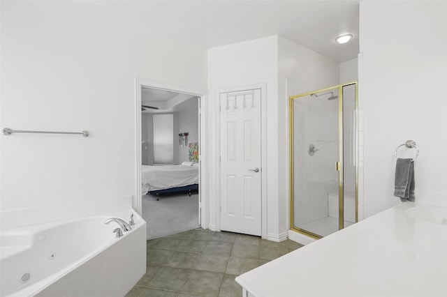 bathroom with tile patterned flooring and independent shower and bath