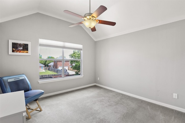 unfurnished room with carpet flooring, ceiling fan, and vaulted ceiling