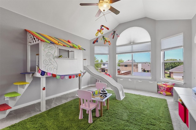 playroom featuring carpet, a healthy amount of sunlight, ceiling fan, and lofted ceiling