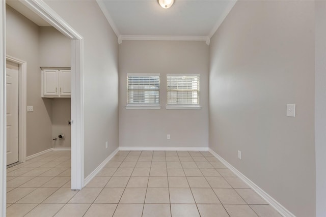 tiled empty room with crown molding