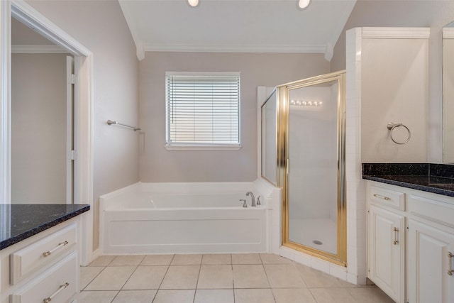 bathroom featuring tile patterned floors, separate shower and tub, crown molding, and vanity